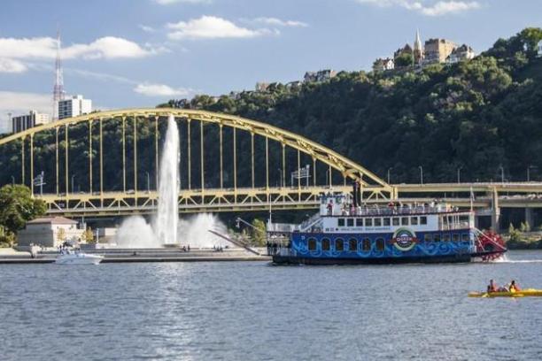 gateway clipper ship on water with bridge